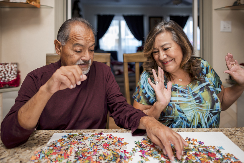 Couple working on a puzzle