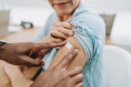 Woman with bandage on arm